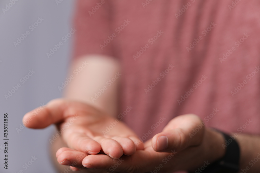 A man holding empty his hand