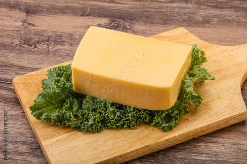 Tasty yelloow Tilsiter cheese brick