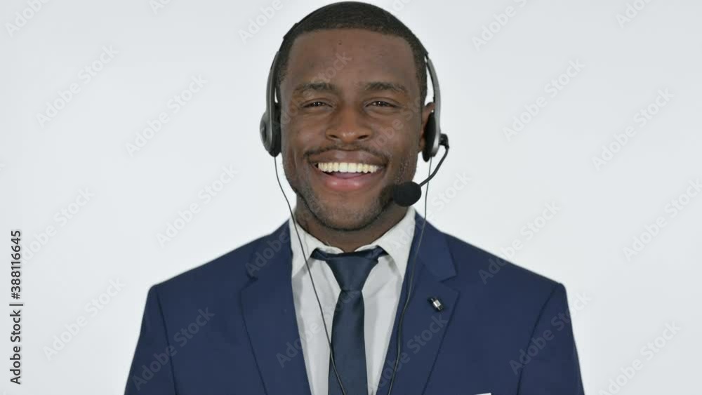 Smiling African Businessman with Headset for Call Center, white Background Smiling African Businessman with Headset for Call Center, white Background