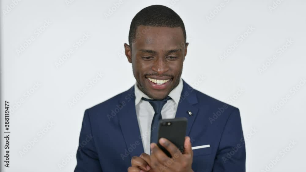 African Businessman Using Smartphone, White Background African Businessman Using Smartphone, White Background