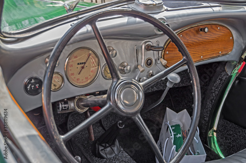 Dashboard and steering wheel of vintage passenger car