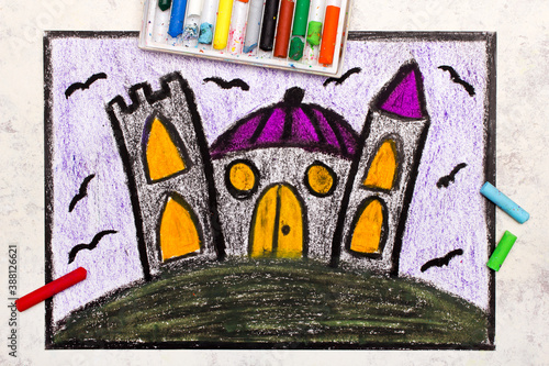 Colorful hand drawing  Old scary castle at night. Halloween drawing on white  background