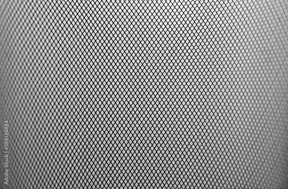 Metal Mesh, Showing Middle Focus to the Manufactured Wire with a Diamond Shaped Construction, Leading to a Side Abstract to the Shaped Cylinder. Metal Mesh, Showing Middle Focus to the Manufactured Wire with a Diamond Shaped Construction, Leading to a Side Abstract to the Shaped Cylinder.