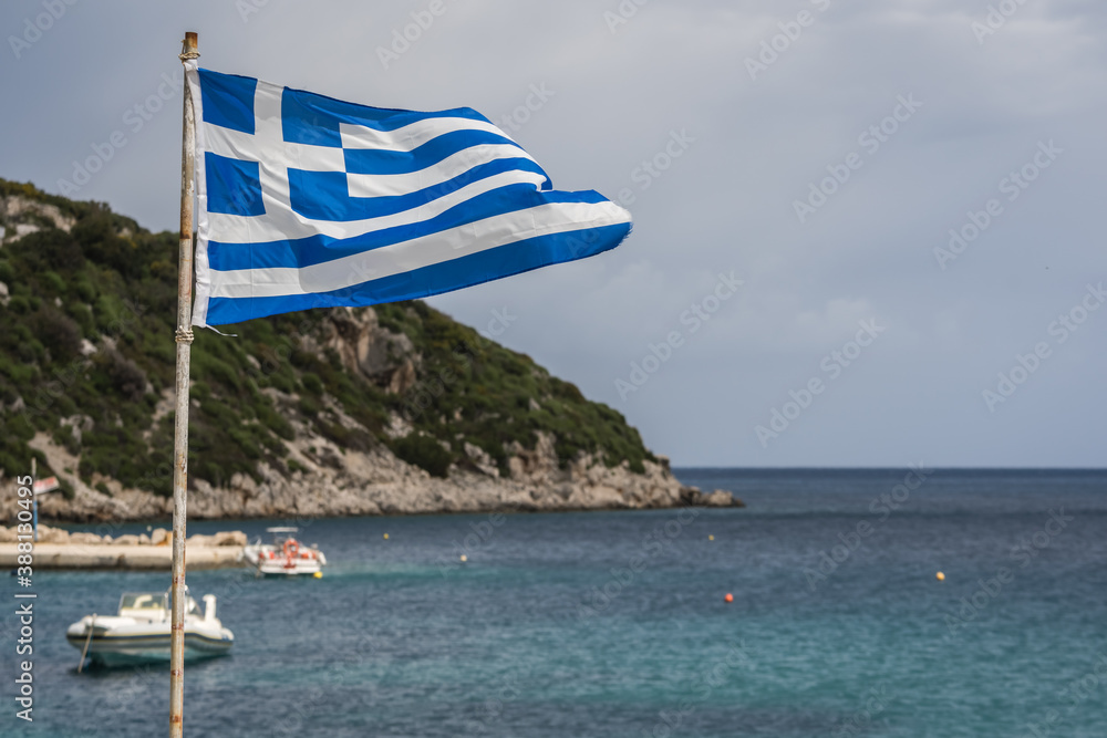 Fototapeta premium Greek flag fluttering in the wind