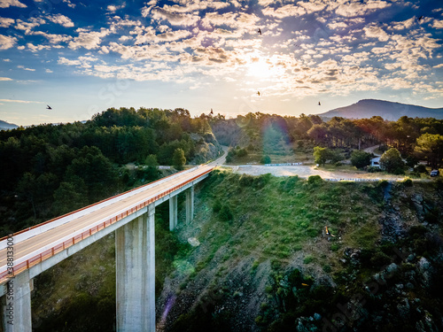 Sunset bridge from drone with clouds