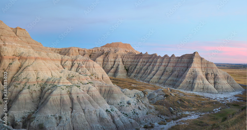 Panorama of the Eroded Landscape of Badlands National Park at Sunset