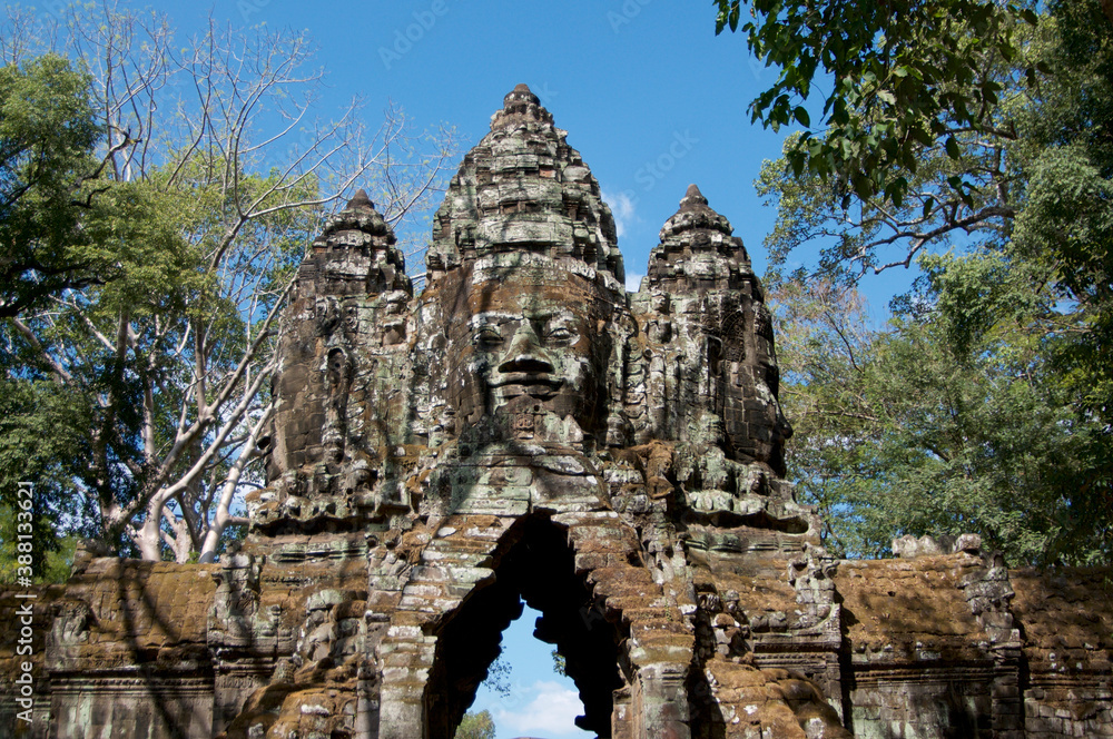 Stone faces at east gate of Bayon Temple in Cambodia
