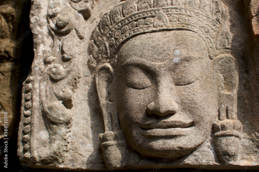 Stone Buddha statue at Angkor Wat in Cambodia