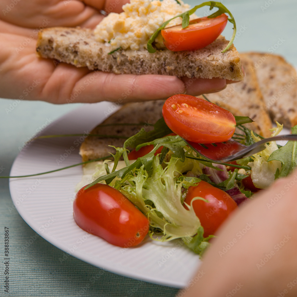 Salad with fresh raw vegetables, tomato, and egg paste. Salad with fresh raw vegetables, tomato, and egg paste.