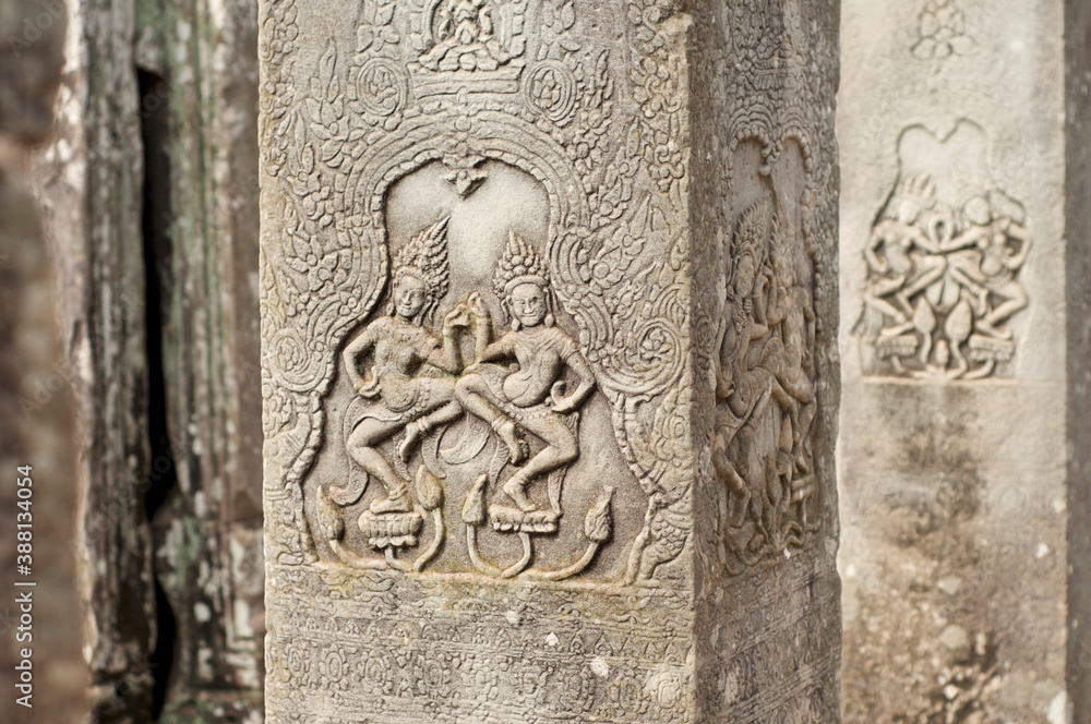 Sacred dancers detail at Bayon Temple in Cambodia