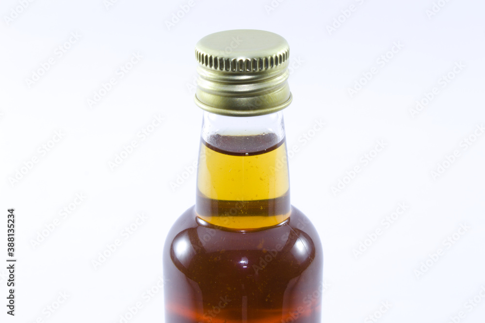 Whiskey bottle with white background