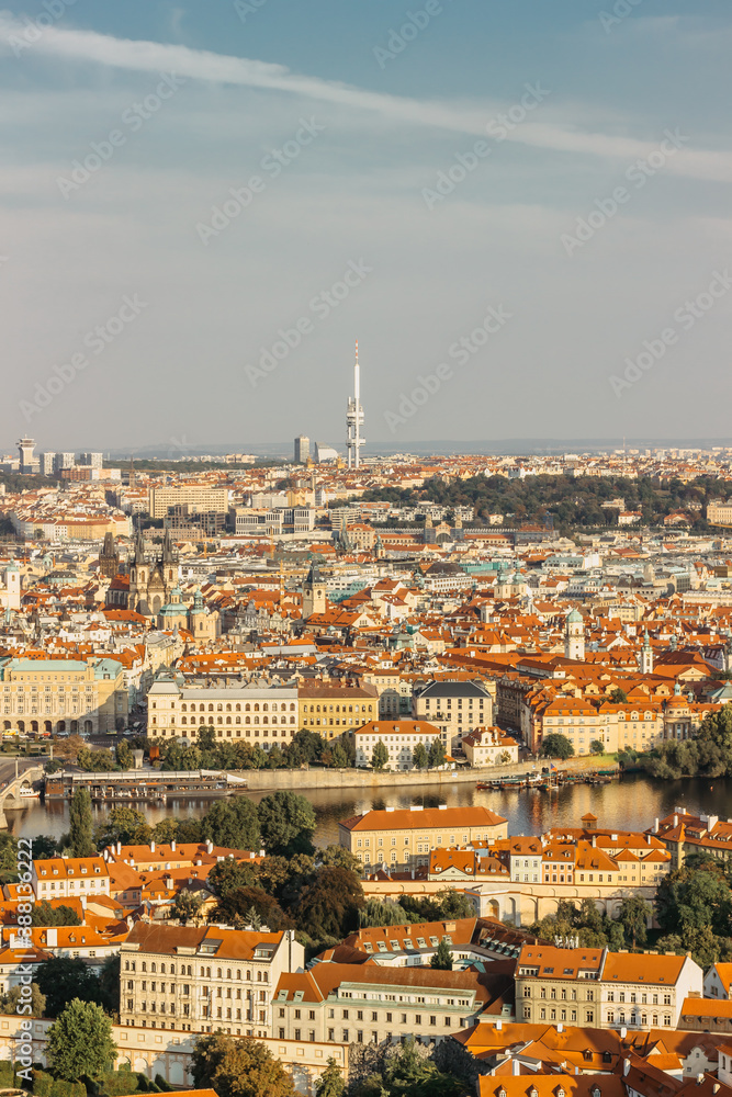 Aerial postcard view of Prague,Czechia. Prague panorama.Beautiful sunny landscape of the capital of Czechia.Amazing European cityscape.Red roofs,bridges over Vltava river,TV tower.Travel scenery.