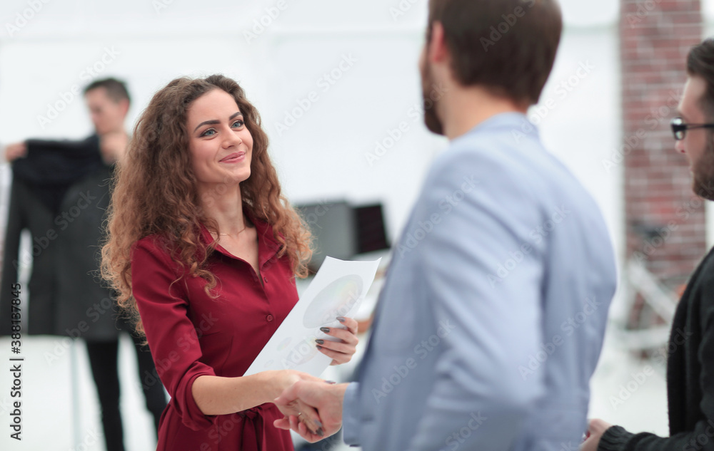 handshake between the designer and the client handshake between the designer and the client
