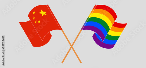 Crossed and waving flags of China and LGBTQ