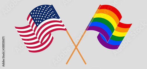 Crossed and waving flags of the USA and LGBTQ