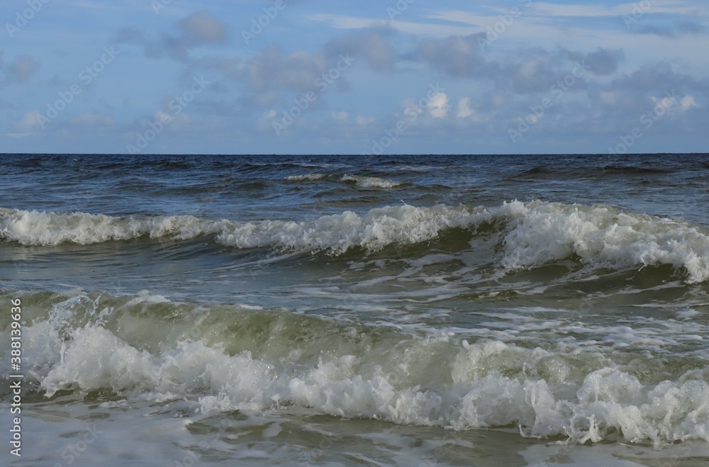 A wave from the ocean goes to the shore A wave from the ocean goes to the shore