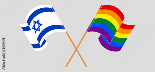Crossed and waving flags of LGBTQ and Israel