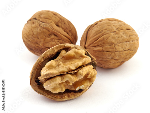 Walnuts and shells lie on a white background.Isolate