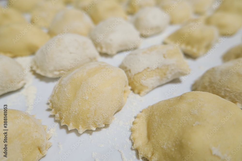 Close up view of handmade italian ravioli pasta just made at home,tradional healthy food