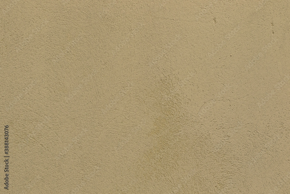 Sand-colored concrete wall texture. Building's facade. Rough plaster wall Sand-colored concrete wall texture. Building's facade. Rough plaster wall