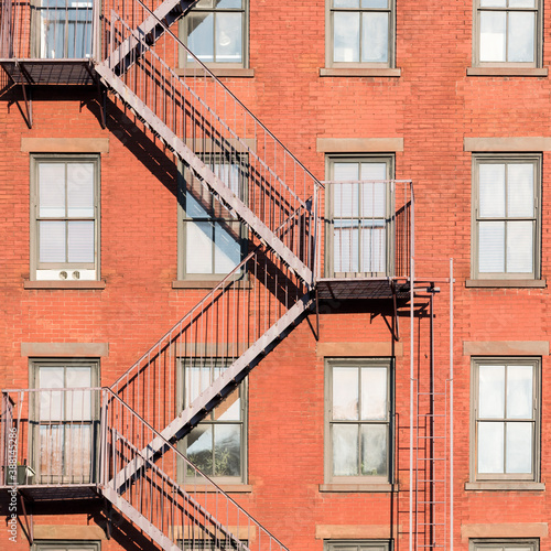 USA, New York, New York City, Fire escape on brick apartment building in Greenwich Village photo