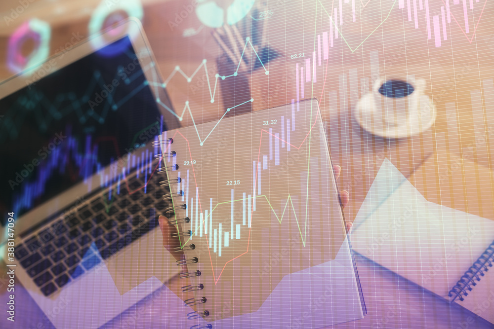Double exposure of businesswoman hands typing on computer and forex chart hologram drawing. Financial analysis concept. Double exposure of businesswoman hands typing on computer and forex chart hologram drawing. Financial analysis concept.