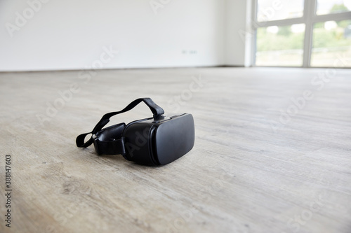 Virtual reality simulator on floor at new home photo