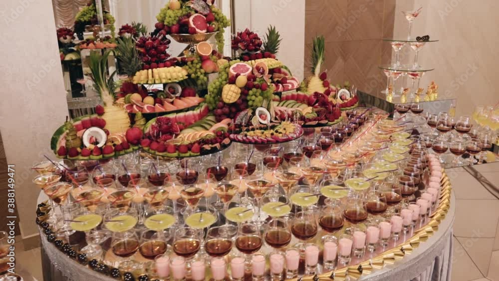 A large beautiful expensive buffet with elite alcoholic beverages of ...