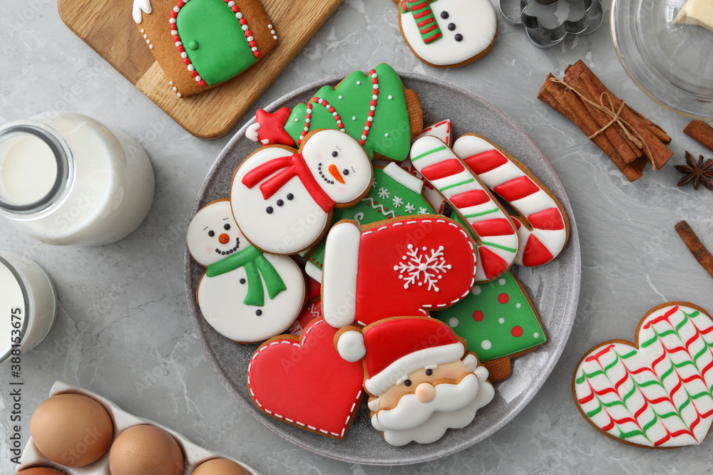 Flat lay composition with delicious homemade Christmas cookies on grey marble table Flat lay composition with delicious homemade Christmas cookies on grey marble table