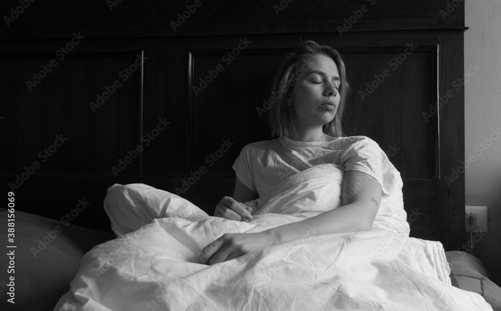 A portrait of a beautiful woman in a bed A portrait of a beautiful woman in a bed