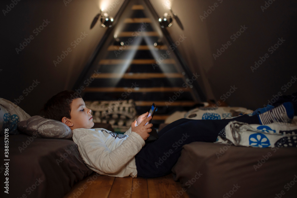 Kids With Tablet In A Dark Room Kids With Tablet In A Dark Room