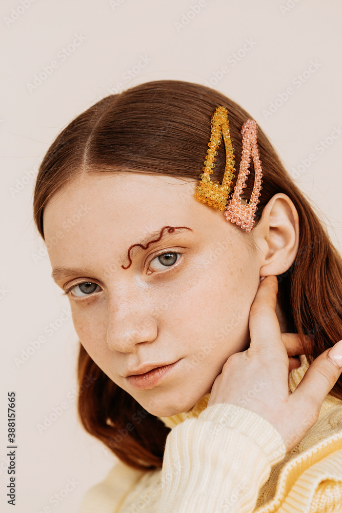 © Sergey Filimonov/Stocksy - Young model with stylish hair clips © Sergey Filimonov/Stocksy - Young model with stylish hair clips
