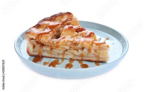 Slice of traditional apple pie with syrup isolated on white