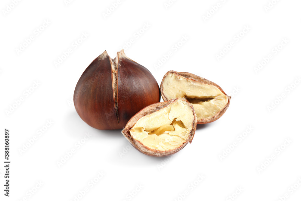 Delicious sweet roasted edible chestnuts isolated on white Delicious sweet roasted edible chestnuts isolated on white