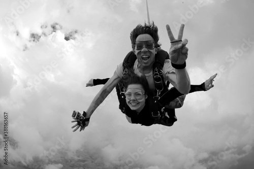 Skydiving tandem happiness black and white