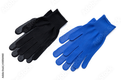 set black and blue textile worker gloves isolated on a white background. above view. studio shot. handyman protective equipment