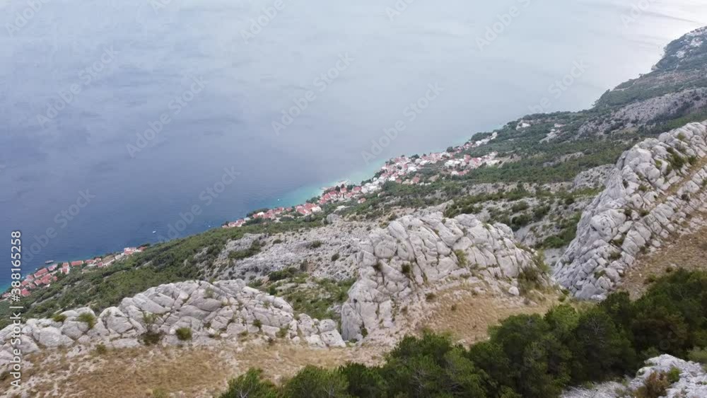 view over the beautiful and small Dalmatian fisher village Pisak (by drone) view over the beautiful and small Dalmatian fisher village Pisak (by drone)