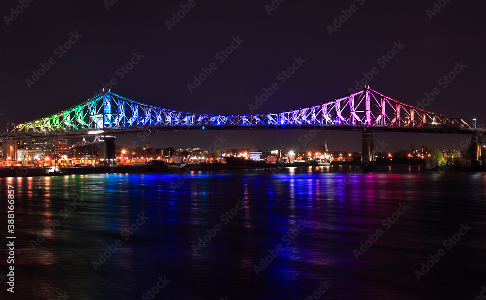 Jacques Cartier Bridge illuminated at night in Montreal, Canada