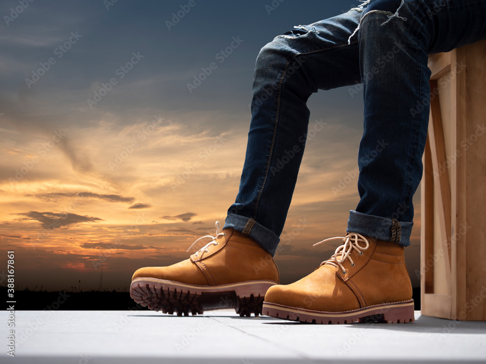 Fashion men with jeans and brown boots leather. Fashion men with jeans and brown boots leather.