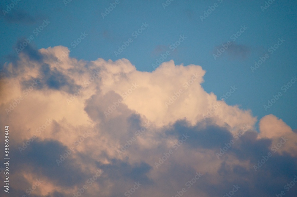A dense cloud at the bottom, and a blue sky at the top. A dense cloud at the bottom, and a blue sky at the top.