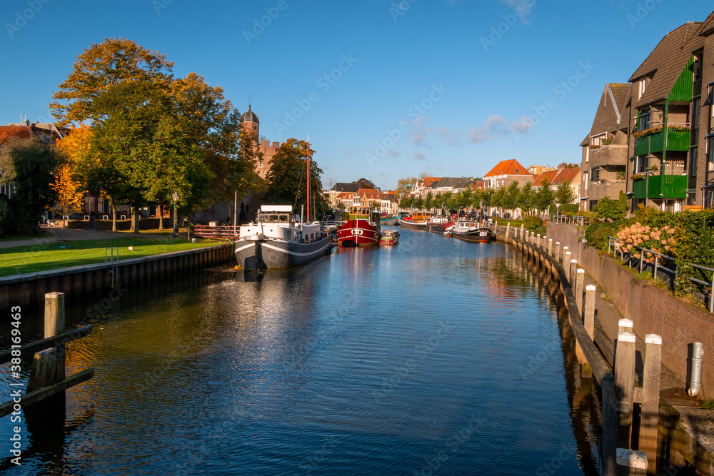 Autumn photo in the Hanseatic city of Zwolle of the canals that surround Zwolle