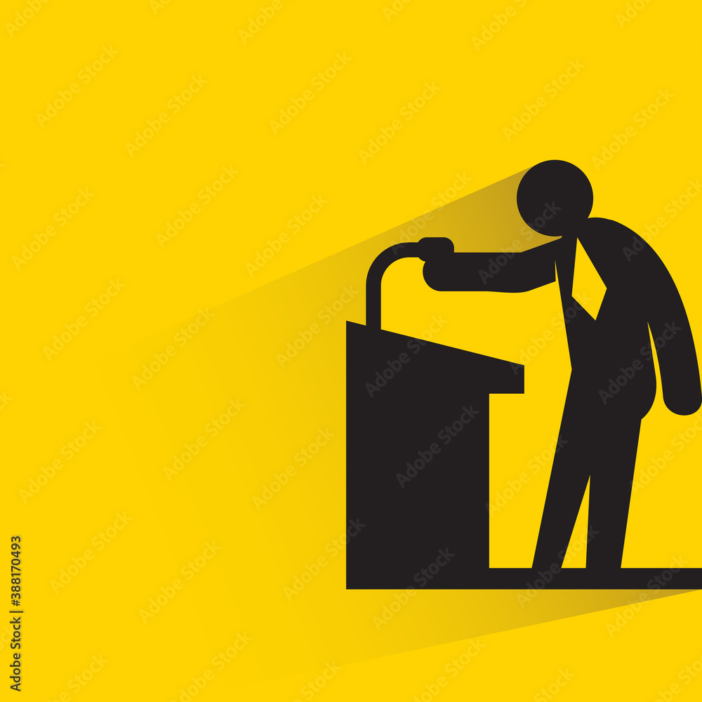 speaker on podium with drop shadow on yellow background speaker on podium with drop shadow on yellow background