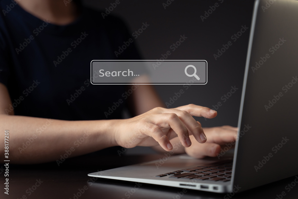 Woman using laptop for searching with browser hologram effect. Woman using laptop for searching with browser hologram effect.