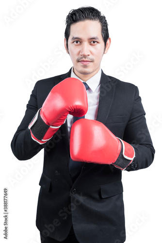 Asian businessman with red boxing gloves © Leo Lintang