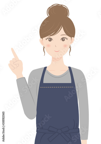 エプロン姿の女性（ワンポイント指差しポーズ）