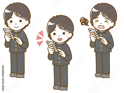 スマホを操作する男子学生