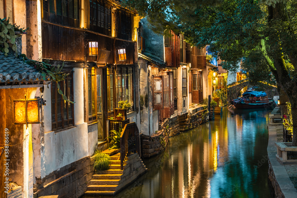 Night view of the river and architecture in Zhouzhuang, an ancient Chinese village in Jiangsu province, China.