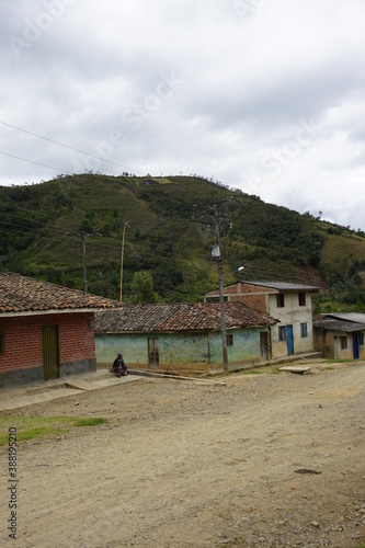 houses on the village and a man