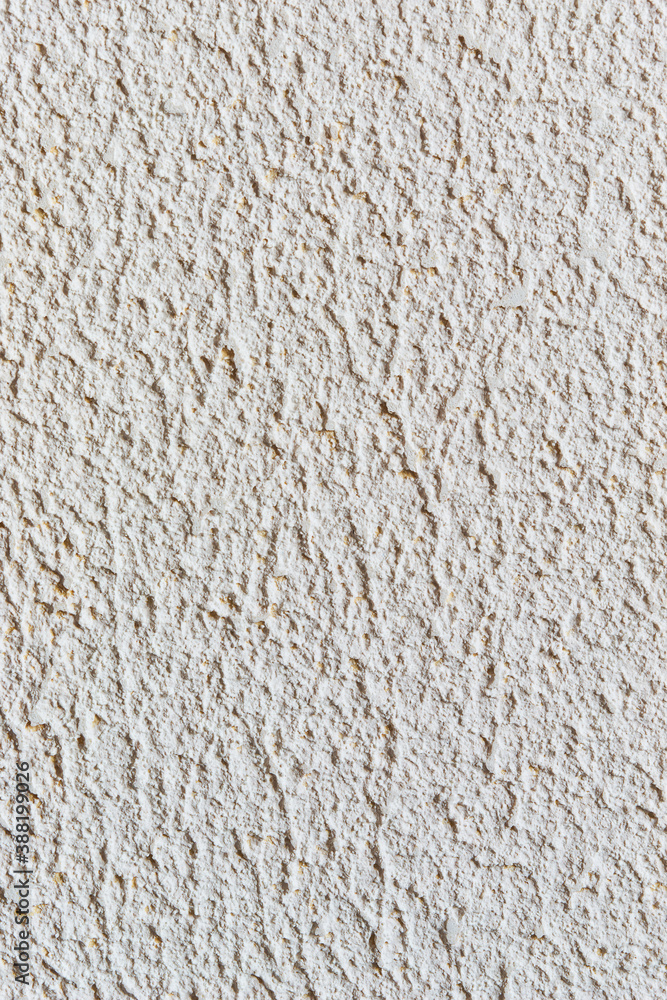 wall with white textured decorative plaster wall with white textured decorative plaster