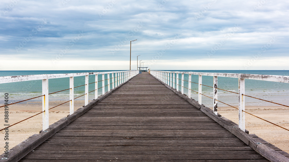 The old largs bay jetty on an overcast day with no people in adelaide south australia on october 26th 2020